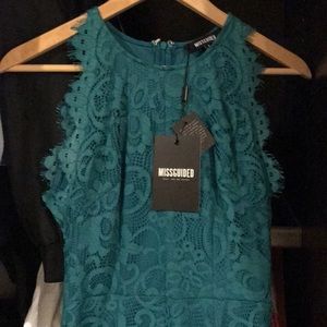 Emerald green lace dress from Miss Guided